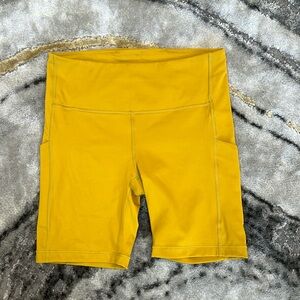 Athleta ultimate stash pocket 7” bike short